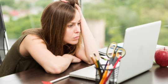 Woman typing business letter