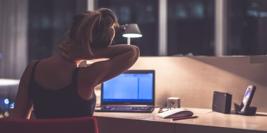 Woman working late
