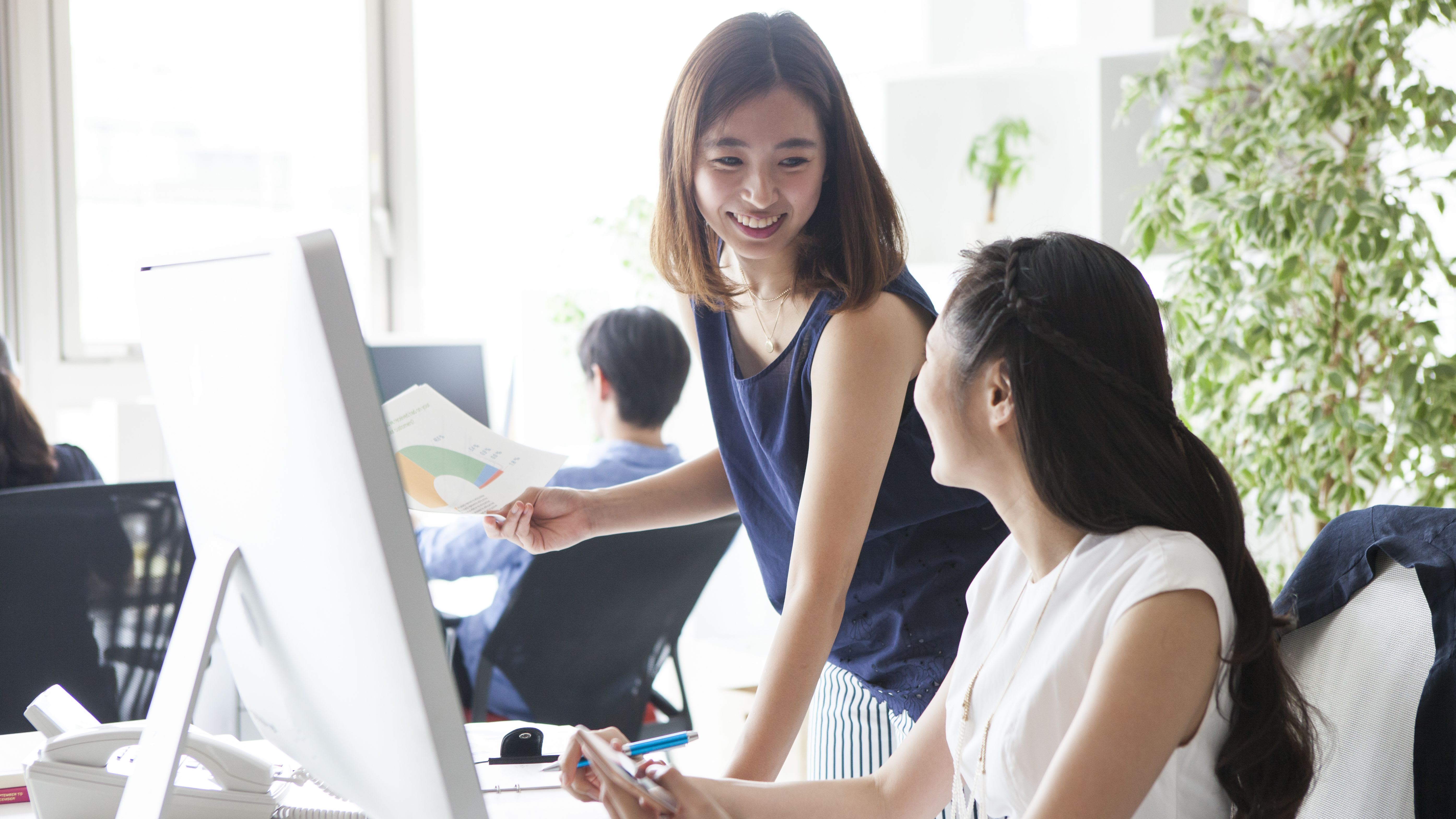 Two women at work
