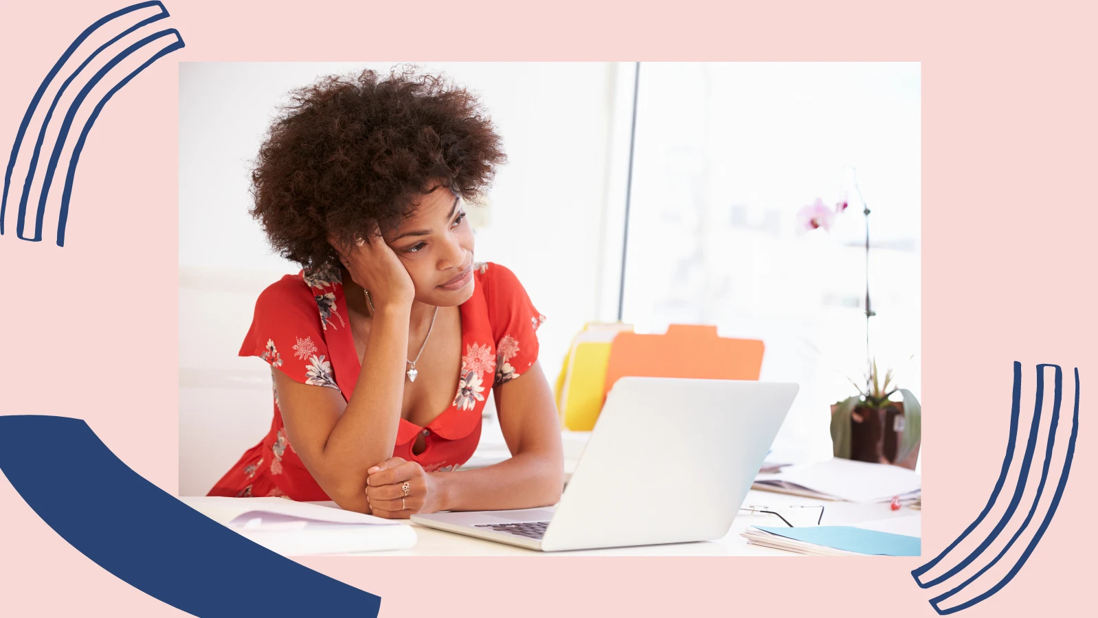 Woman leaning against desk. 