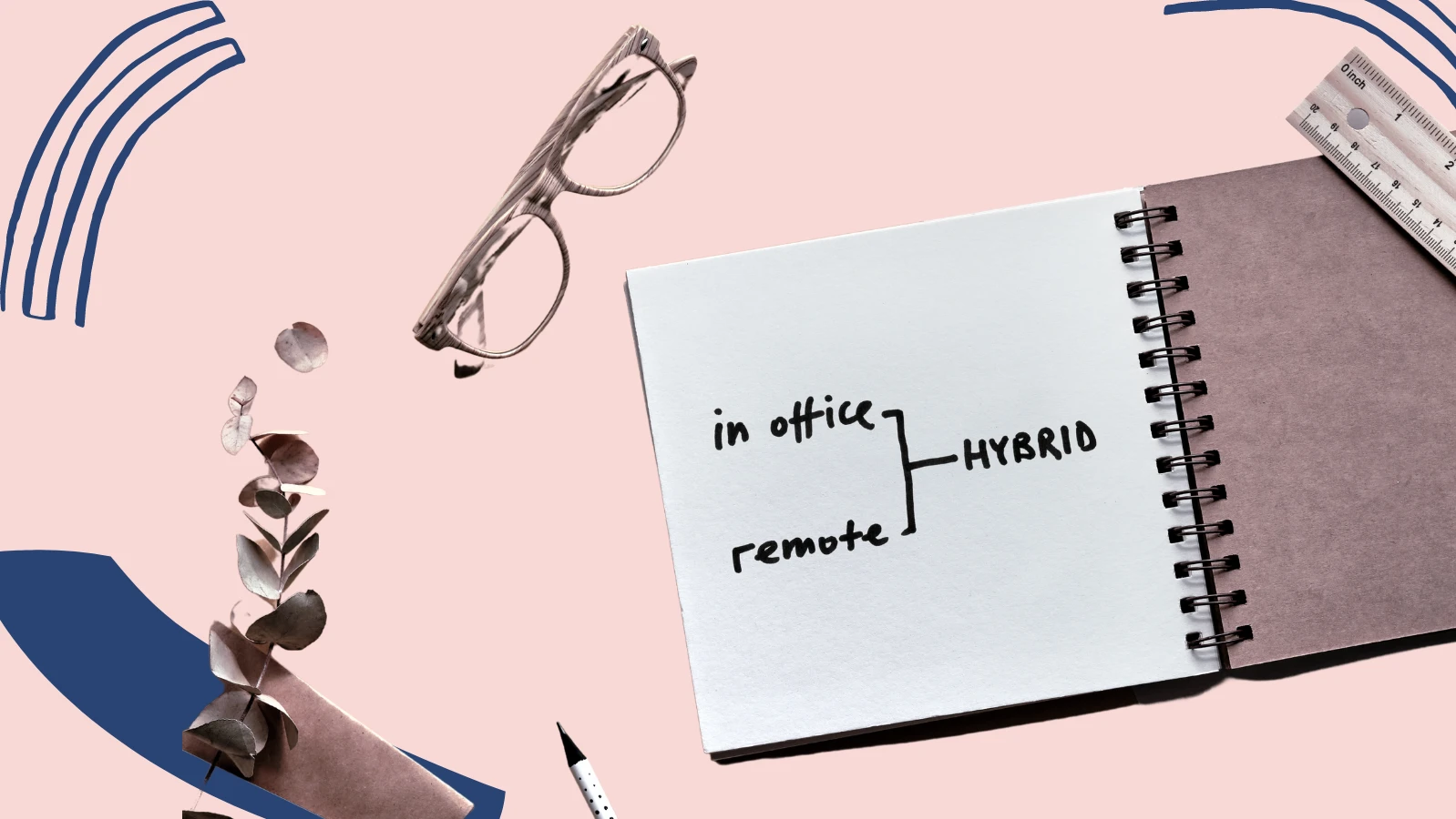 a planner and glasses on a surface