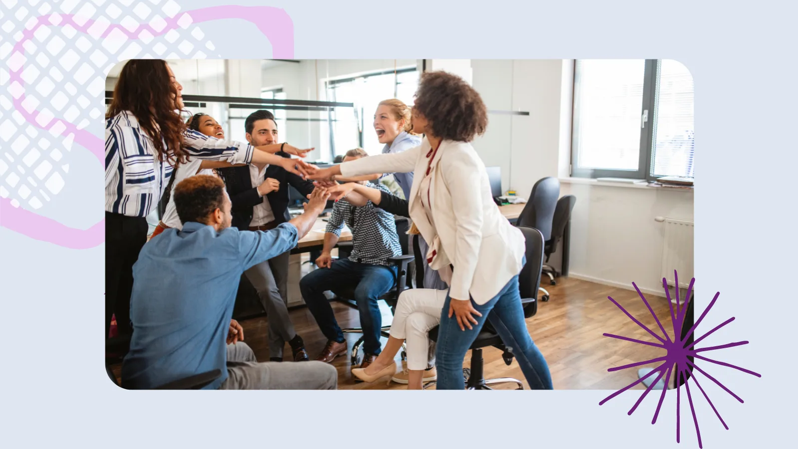 a group of people celebrating at work