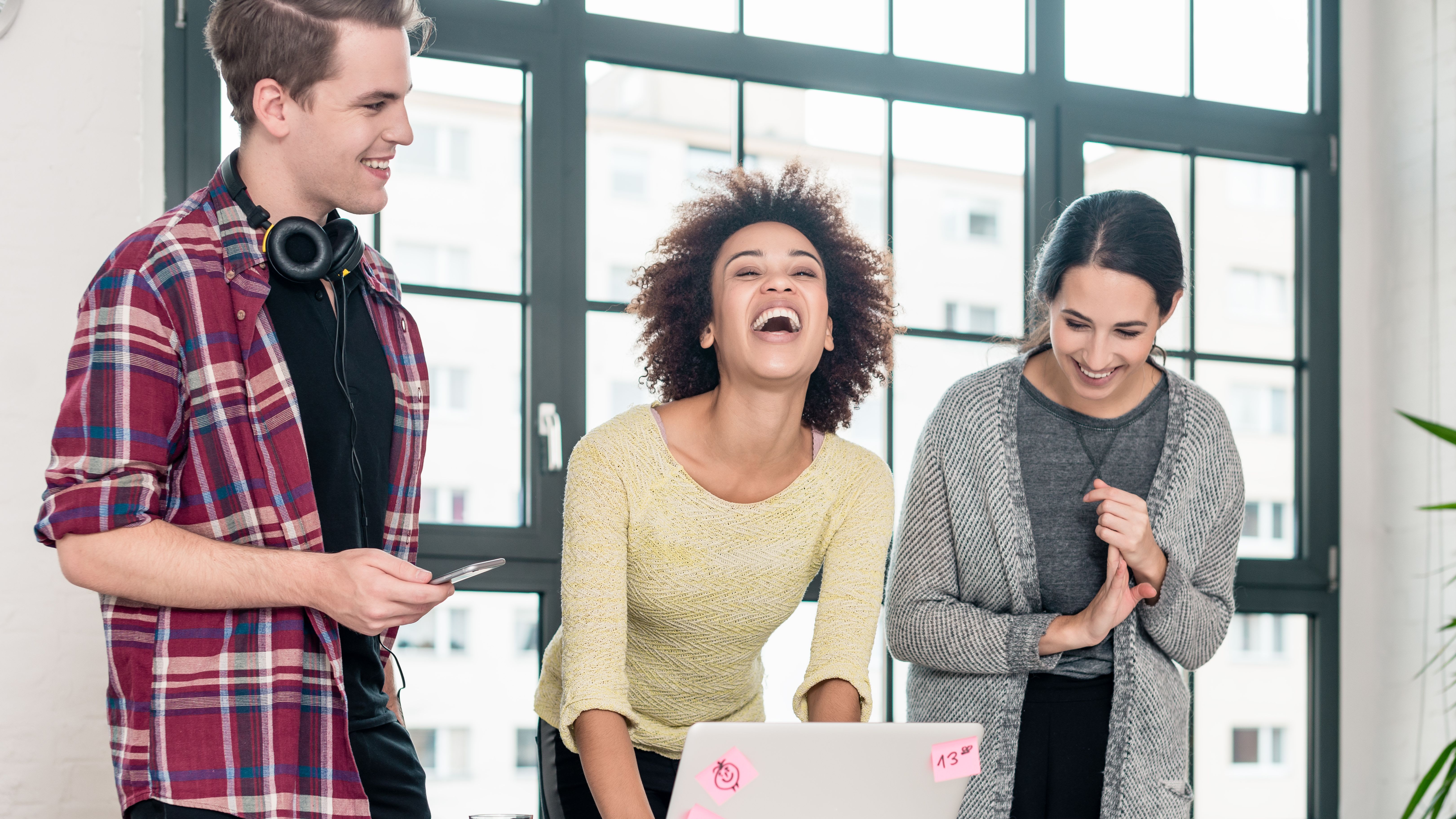 Coworkers Laughing at Work