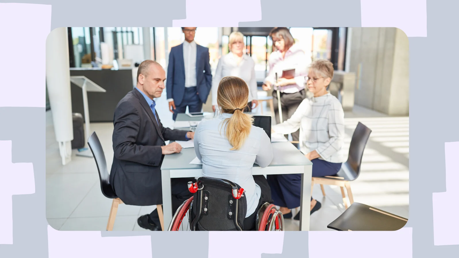 a group of people in a meeting