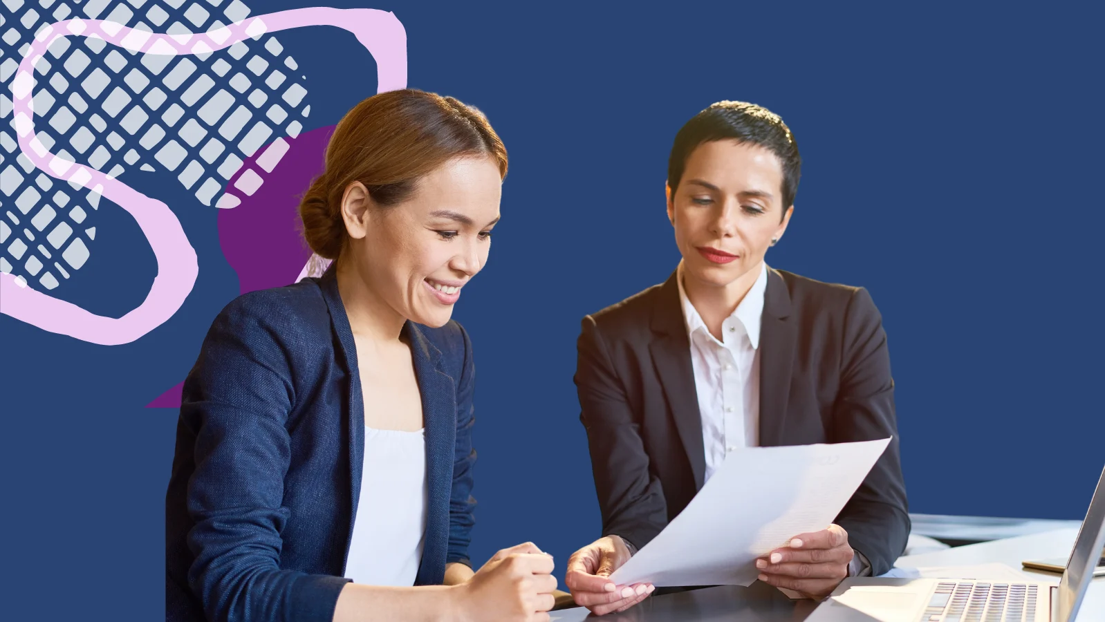Two woman going over paperwork