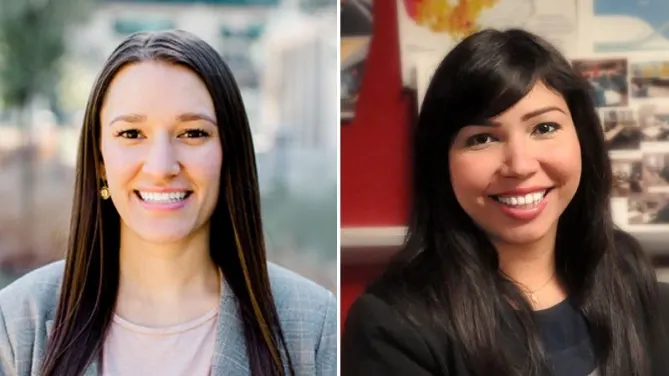 two woman smiling 