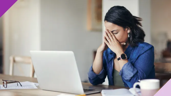 frustrated woman at her laptop