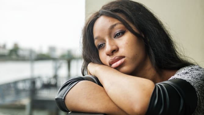 young woman dealing with depression after college
