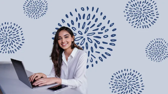woman smiling while typing