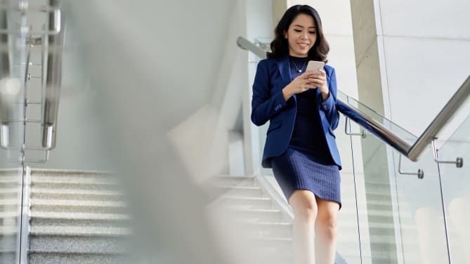 Woman walking down stairs