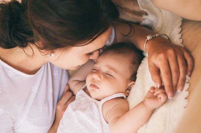 Woman Singing to Baby