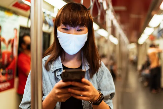 Woman traveling with mask