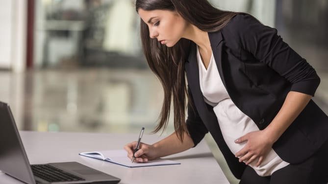 Pregnant Woman Working