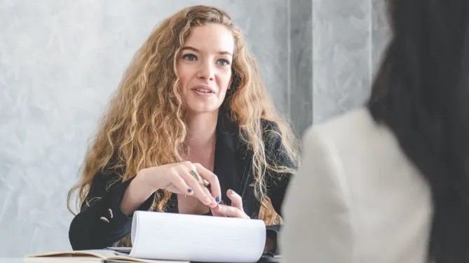 women talking at work