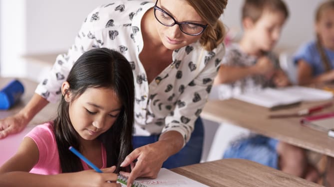 Teacher with student