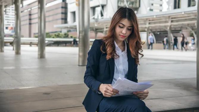 Woman holding resume