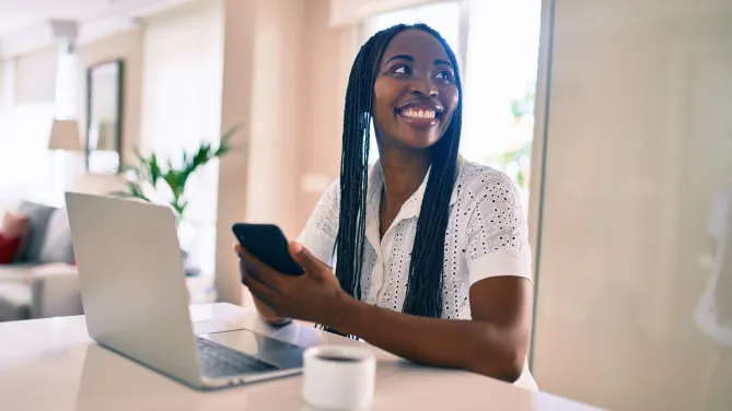Happy woman on laptop