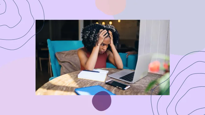 woman with hands on head looking frustrated