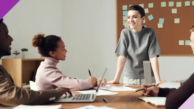 Professionals engaging in an office meeting, illustrating how to have a good day at work