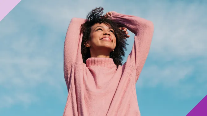 optimistic woman looking at the sky