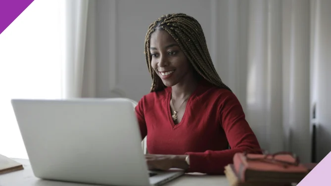 Professional on a computer, illustrating how to put volunteer work on a resume