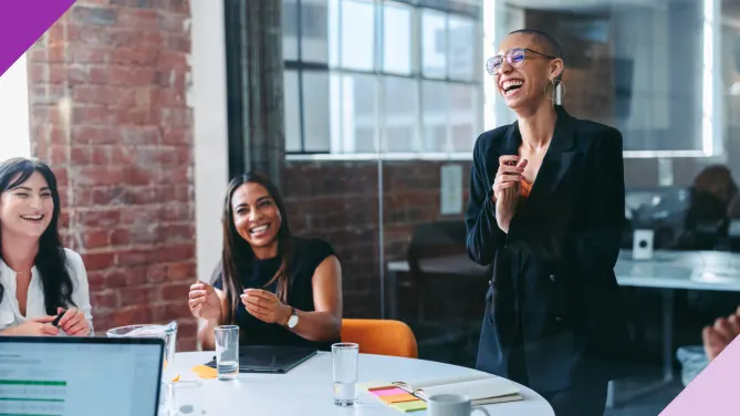 Professionals in an office setting, illustrating how to overcome imposter syndrome at work