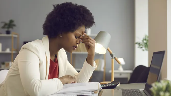 Upset woman on computer