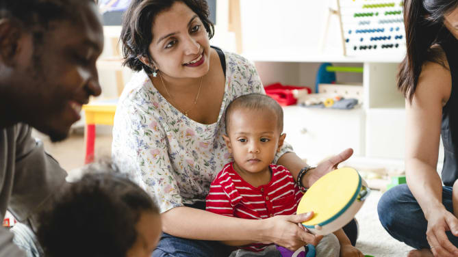 Woman with son in class