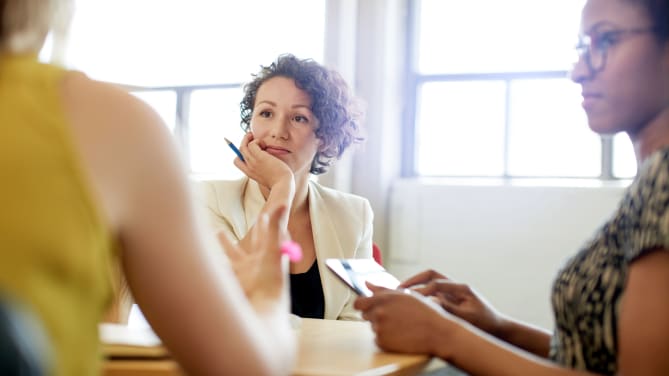 Annoyed woman listening