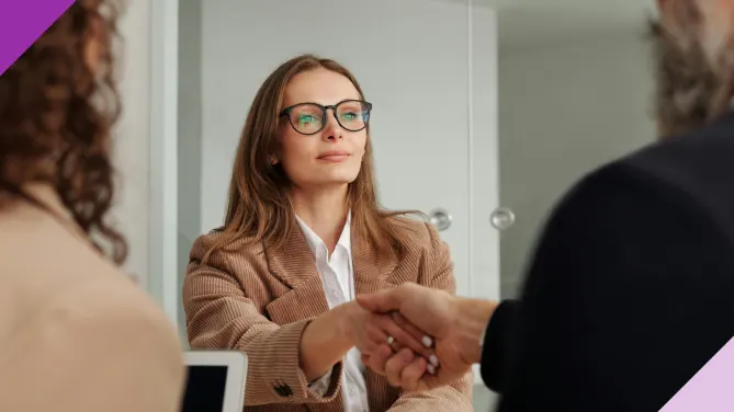Professional in an interview, illustrating how to find a new job while employed