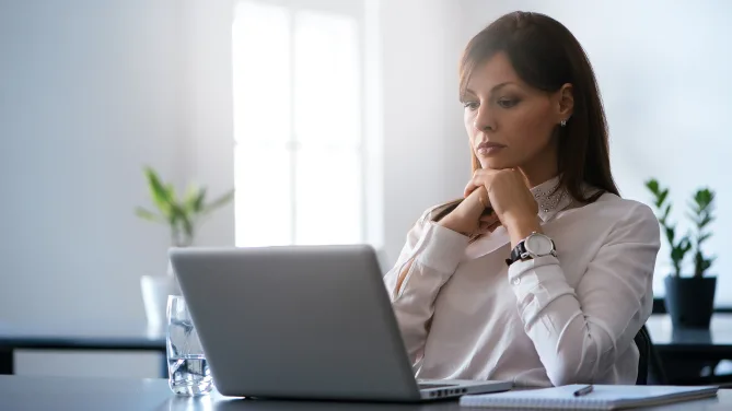 Woman thinking about how to intervene in a conflict