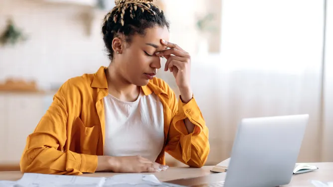 Woman working and stressed