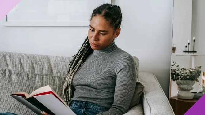 Woman reading a personal finance book