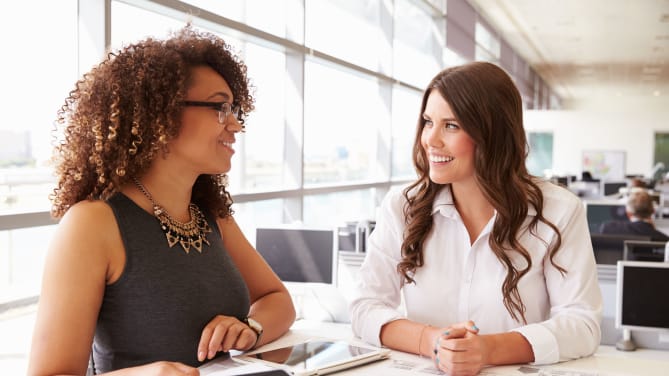 manager and employee talking