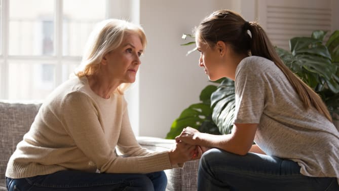 woman talking to her daughter