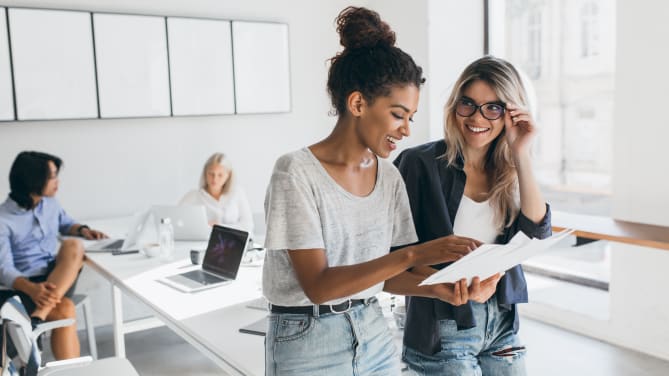 Two women at work