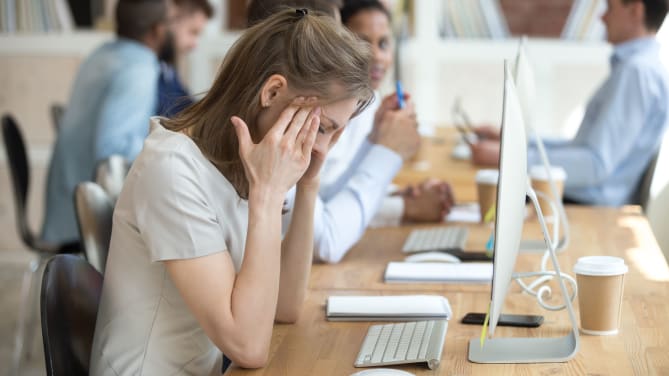 Woman frustrated at work
