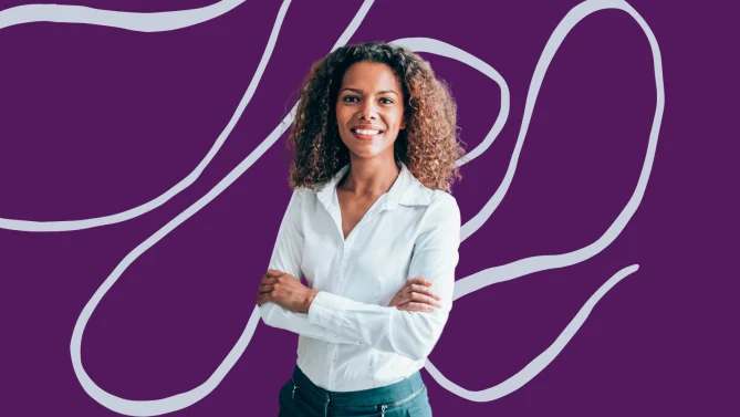 a woman smiling with her arms crossed over her chest
