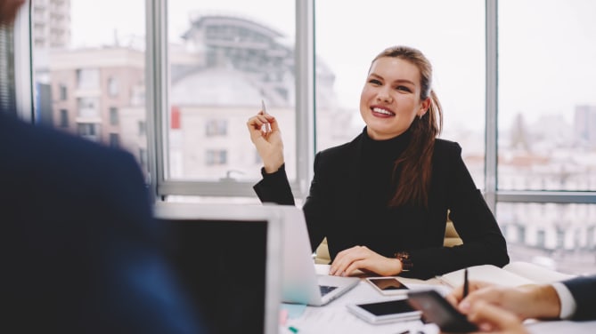 Woman negotiating at work