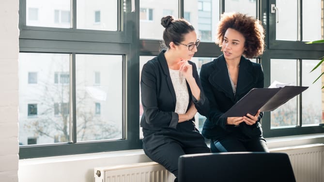 Two women at work 