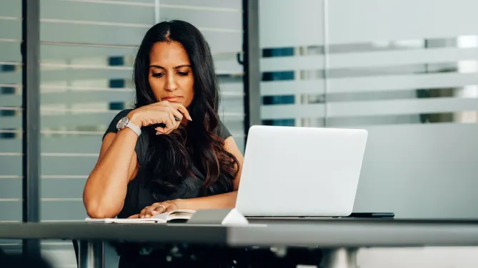 Thinking businesswoman