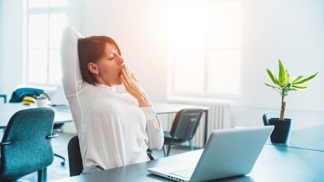 Woman Sleeping at Work