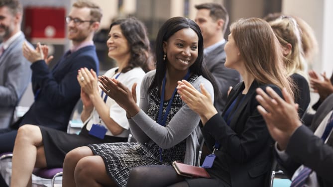 Women clapping