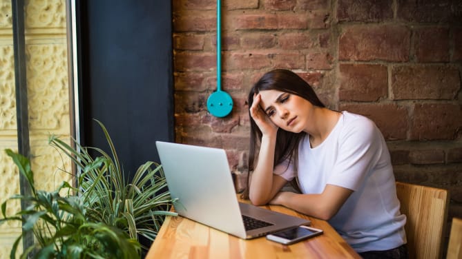 Woman typing on computer