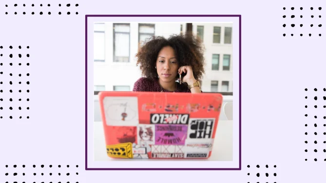 woman on phone call at desk