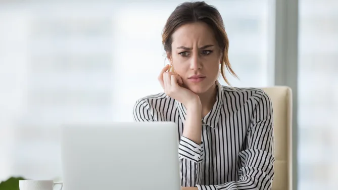 Woman typing at work 