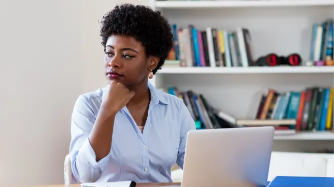 woman looking upset at work