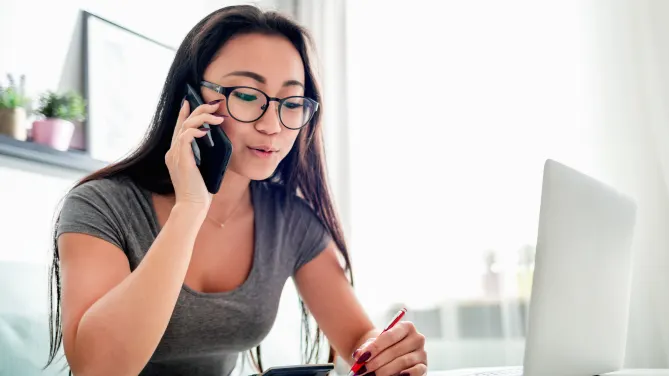Woman with calculator
