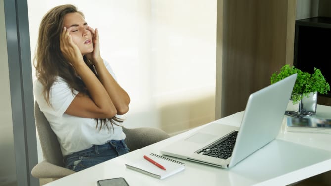 Frustrated woman at work