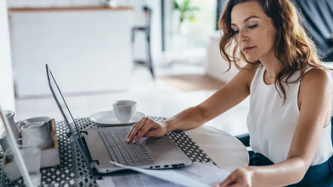 Woman looking at resume